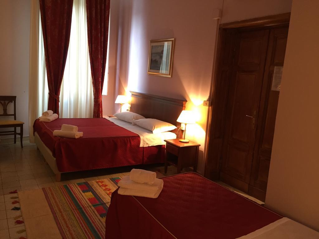 Astrid Hotel Florença Quarto foto