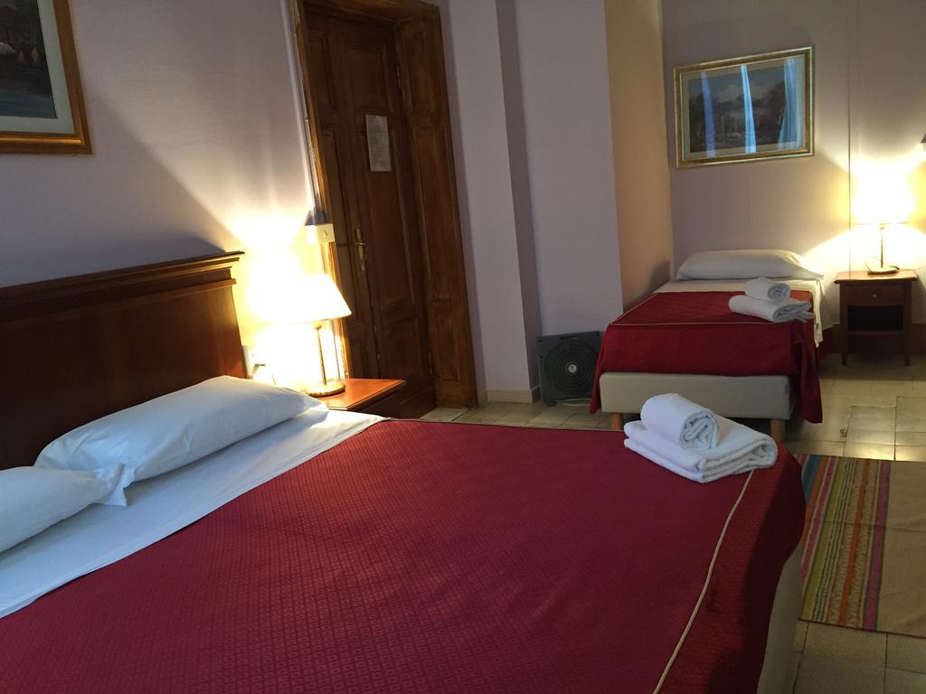 Astrid Hotel Florença Quarto foto