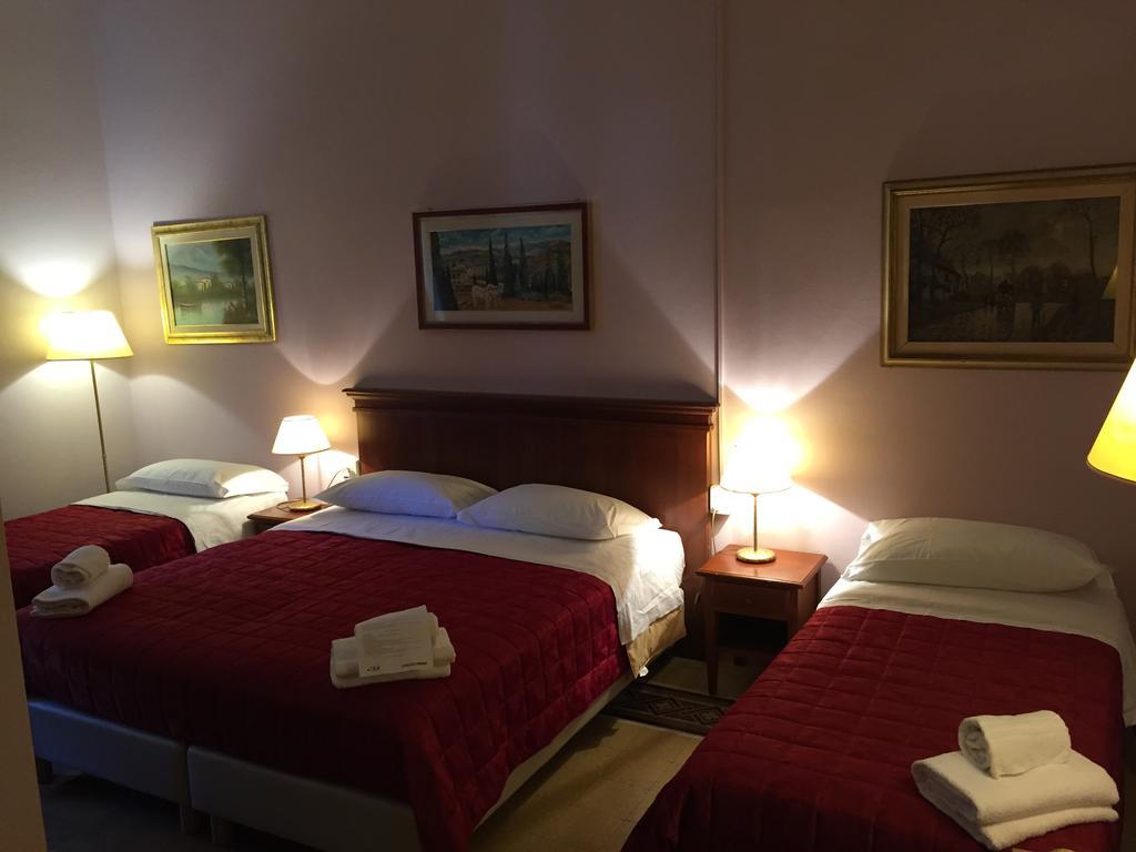 Astrid Hotel Florença Quarto foto
